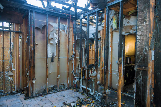 Professional Fire Damage Restoration technician working in Edgemoor, DE